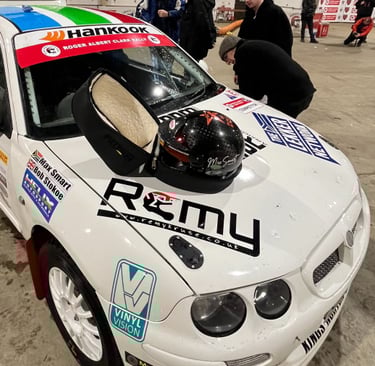 a rally car with a helmet on it