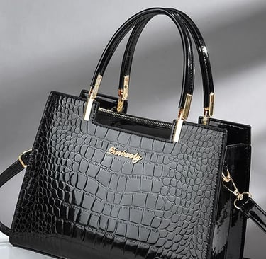 a black and white purse with a black and gold purse