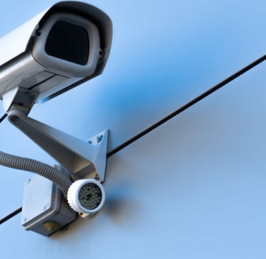 a camera mounted to a wall of a building