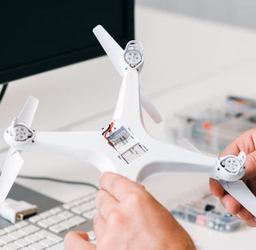 a man is holding a remote control system