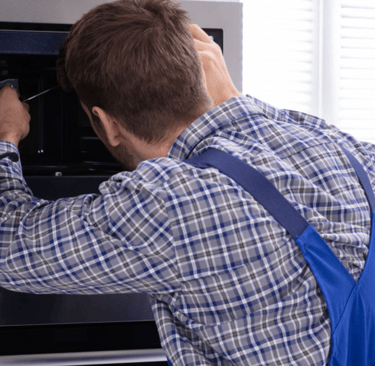a man in a blue apron and overall overall overall overall overall overall overall overall overall