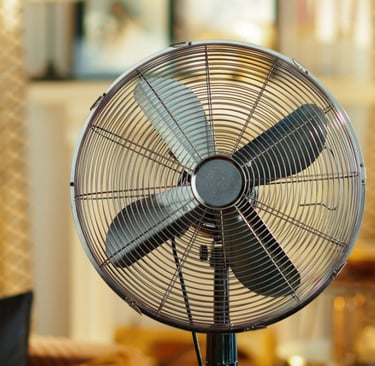 a fan on a table top with a fan