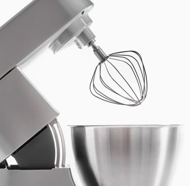 a mixer with a mixer and a mixer in the background