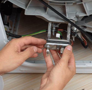 a person is holding a phone in their hand