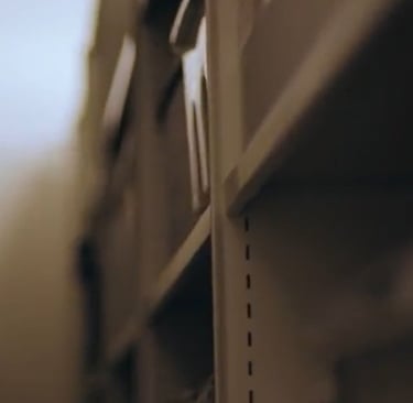 A row of shelving in an archive store