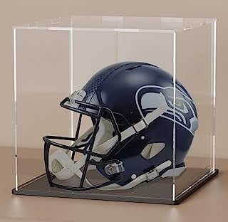 Football helmet inside a clear acrylic display box.