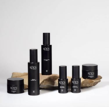 a group of black and white skin care products