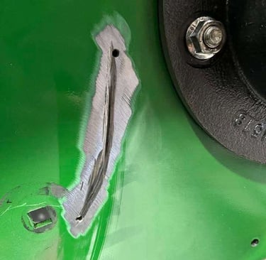 deep scrape in farm equipment