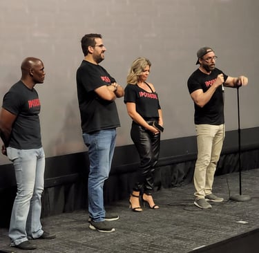 a group of people standing on a stage