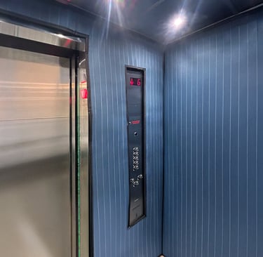 elevator interior with protection pads installed to protect the elevator during moving times
