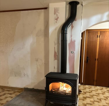 Installation de poêle à bois traditionnel