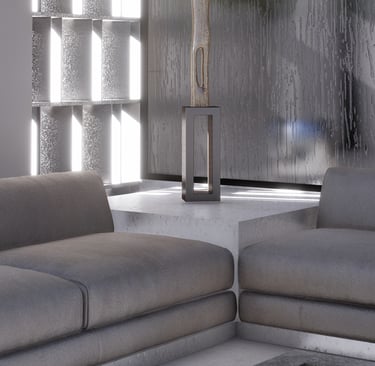 The arrangement of gray sofas and a standing sculpture in front of a modern, textured wall.
