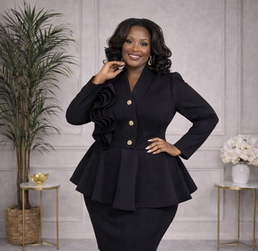 a woman in a black dress and black heels