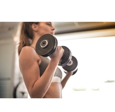 Woman lifting dumbbells for strength training