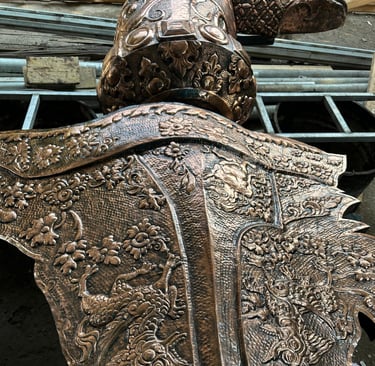 Bagian Patung keris berbahan tembaga