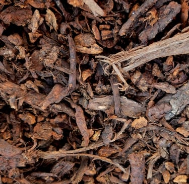 a bunch of mulch used and spread in a garden