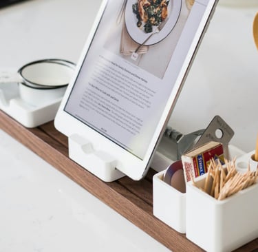 a tablet computer sitting on a counter top