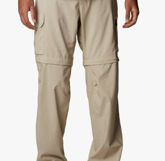 a man in a blue shirt and tan pants