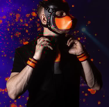 Man posing in a pup mask.