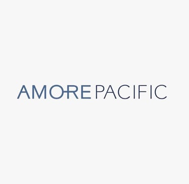 Logo of AMOREPACIFIC, a global beauty brand whose standards are met by King Fly.