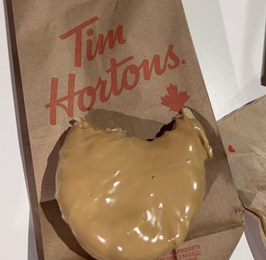 a maple donut on a Tim Hortons bag
