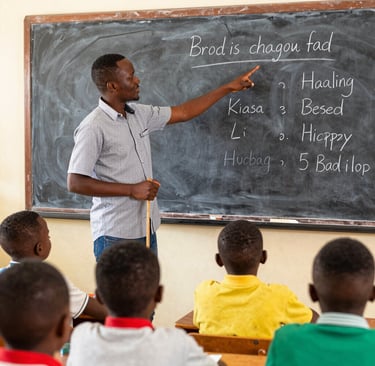 A young woman proudly holding a certificate after completing a skills training.
