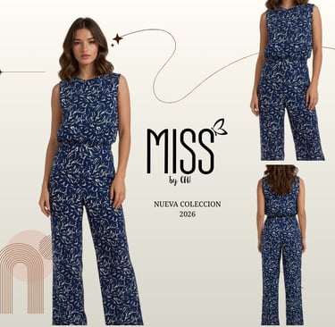 Woman wearing a navy blue sleeveless jumpsuit with a white abstract print from the 2026 MISS collection.