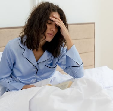 Woman waking up tired due to sleep apnea and poor sleep quality
