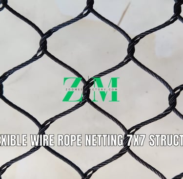 Close-up of hand-woven flexible wire rope netting made from 304 stainless steel, showing the diamond