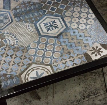 Tavolo in ferro con piano in Gres porcellanato