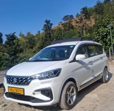 kumaoni tour & travels Ertiga taxi