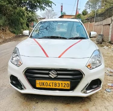 Kuamoni tour & travels Dzire Taxi