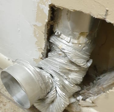 A crushed dryer vent connection hose in Estero Florida