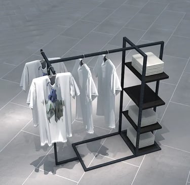 Modern black metal retail clothing rack with white t-shirts and display shelves on a grey floor.