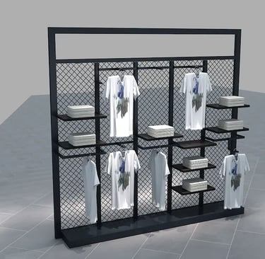 Modern black metal mesh retail clothing display rack with folded apparel and hanging t-shirts.