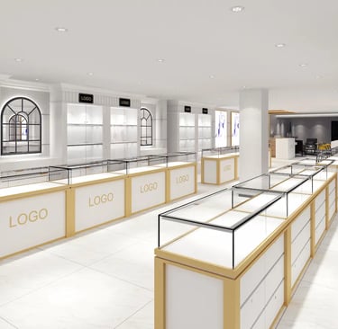 Luxury jewelry store interior featuring white and gold glass display cases and wall shelving.