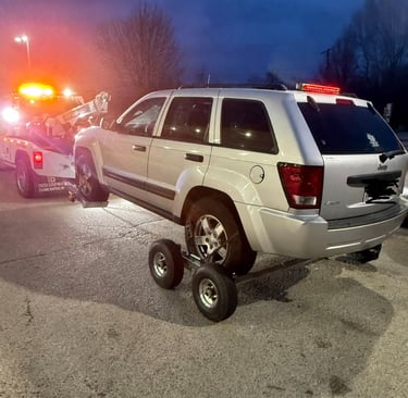 Lightning Towing and Recovery Services towing a Jeep Grand Cherokee in Bourbonnais Illinois