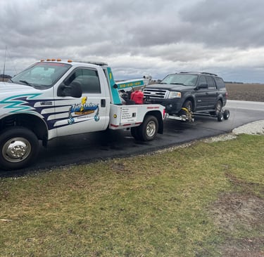 Lightning Towing and Recovery Services towing a Ford Expedition in Bourbonnais Illinois
