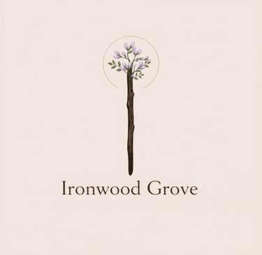 Ironwood Grove logo featuring a blooming branch with purple flowers and green leaves.