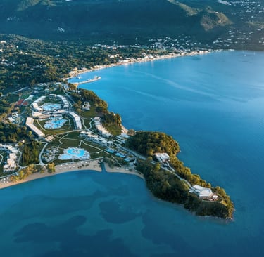 Ikos Odisia resort ariel view of the beach, swimming pools and hotel