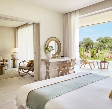 one bedroom garden suite at Ikos Odisia with view of the landscape gardens