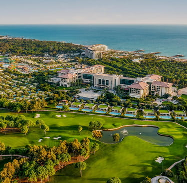 Aerial view of a luxury beachfront golf resort Regnum Carya