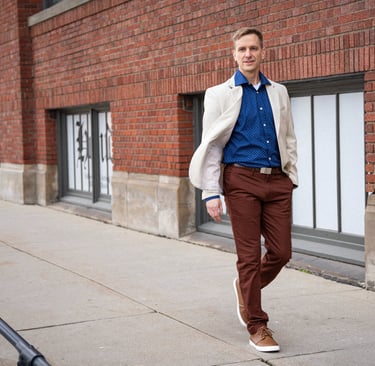 Remy walks along the sidewalk.