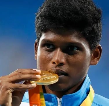 Mariyappan Thangavelu, Indian Paralympic high jumper, winning gold medal.