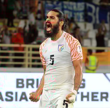 Sandesh Jhingan celebrating passionately after a match victory.