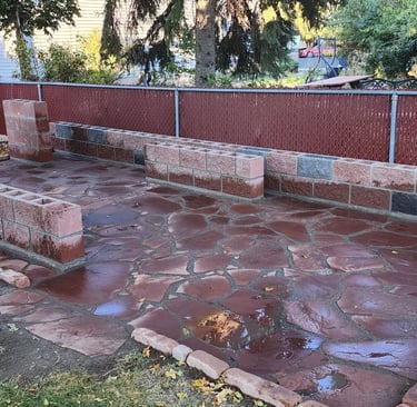 CMU patio sitting area and barbeque pedestal with red and charcoal CMU
