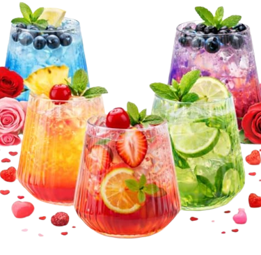 Refreshing assortment of colorful fruit cocktails and mocktails garnished with fresh berries and mint.