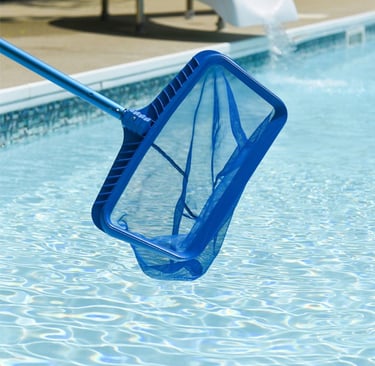 A blue heavy-duty swimming pool leaf skimmer net cleaning debris from clear pool water.