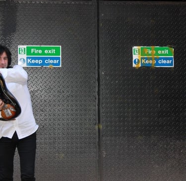 Guitarrista en Manchester