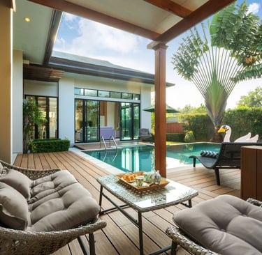 a patio with a pool and a lounge area